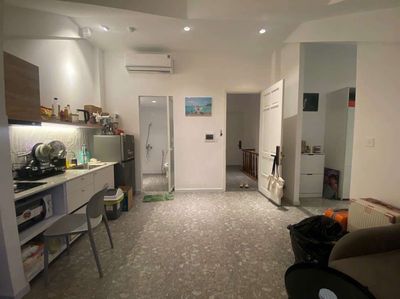 The apartment is a super wide balcony bedroom - full of furniture near Chen's brain