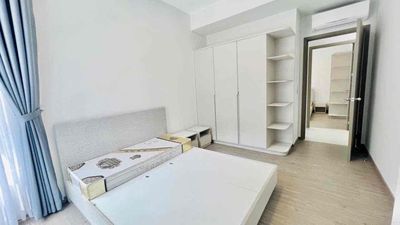 The corner of the three bedrooms for rent, there's a bed, the fridge. It's 11 million a month.