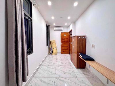 The two bedrooms are full of furniture in the shower.