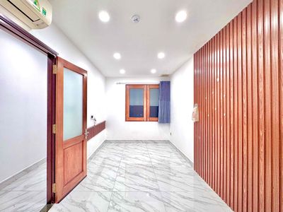 The two bedrooms are full of furniture in the shower.