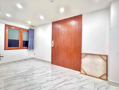The two bedrooms are full of furniture in the shower.