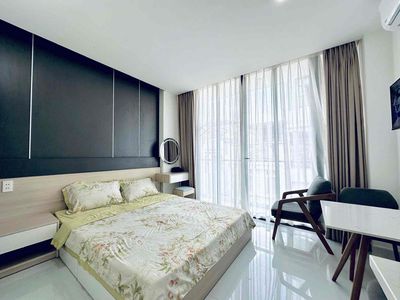 The Hoàng Văn Thụ studio has a clear balcony -- full interior near the airport.
