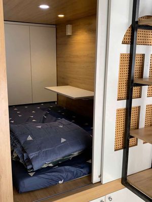 The modern sleepbox in District 8, which is 1 million.