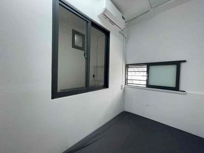 The studio room is empty. One bedroom.