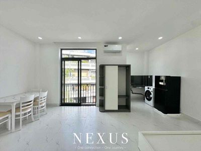 A full-house service apartment with its own balcony washing machine near the flower park