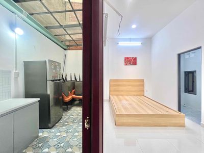 A ground bedroom behind a kitchen cup, full of new furniture 100 percent flower village
