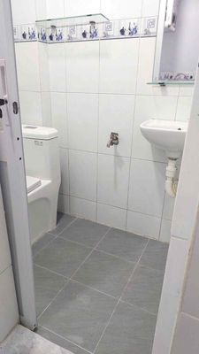 The apartment house is near the airport. The ground floor is only six million refrigerators.