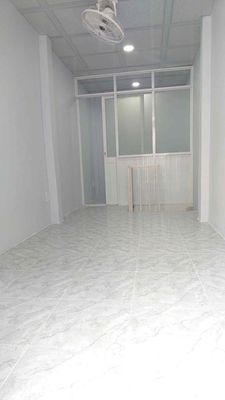 The apartment house is near the airport. The ground floor is only six million refrigerators.