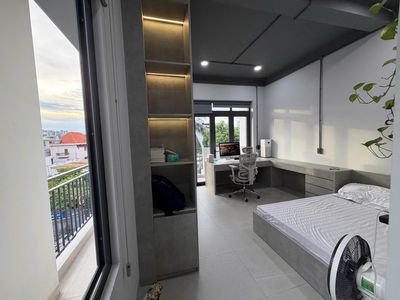 It's the owner of the new house that's full of furniture - near the airport.