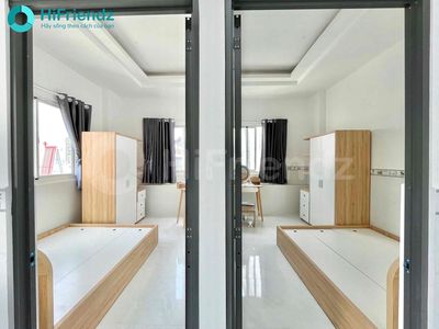 The mini apartment is two bedrooms. A big bathroom right next to the fifth district's office.