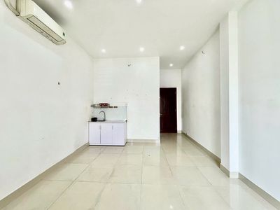 A cheap boarding room near Funky District 7 has its own balcony