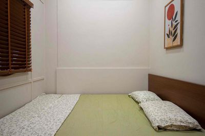 Rent an apartment that's decor into two new bedrooms.