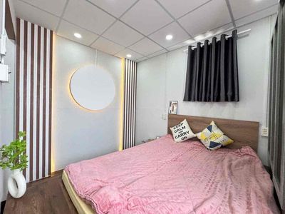 The center of the 10th. Two bedrooms. Two toilets. That's for six million.