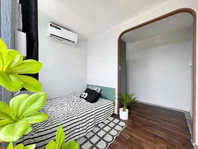Two fine bedrooms are full of furniture.