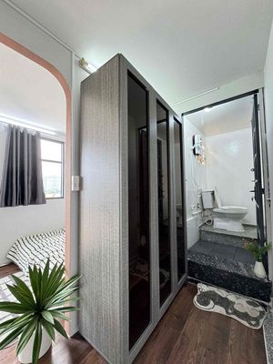 Two fine bedrooms are full of furniture.