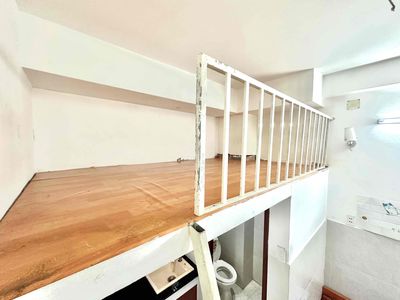 "A room with a guard and no guard." "A full block of furniture."