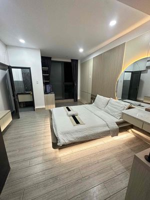 The master's apartment is right near the end of the five Gò Vấp dog cages.