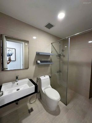 A separate bedroom not sudio with a balcony full of photos of his interior