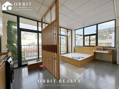 Rent the balcony studio at the right end of the seven.