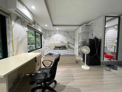 The new studio is near the University of Base Three.
