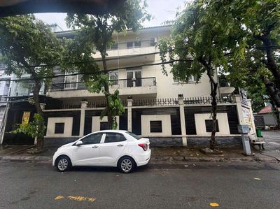 The corner, the alley, the lot, the garage, three bedrooms, four toilets.