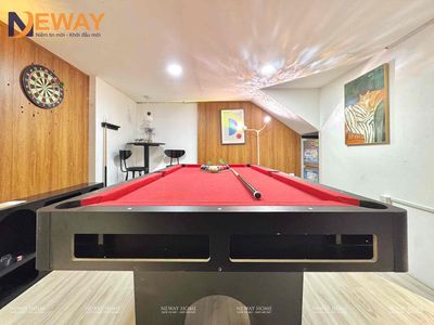 Superbess have 1 0 2 available pool table in the room five minutes away.