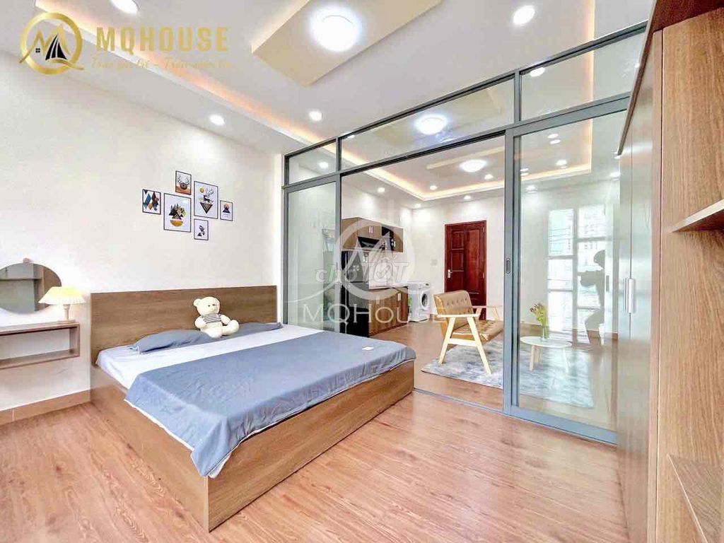 The apartment is a super-wide kitchen room, right at  cmt8 - 716.