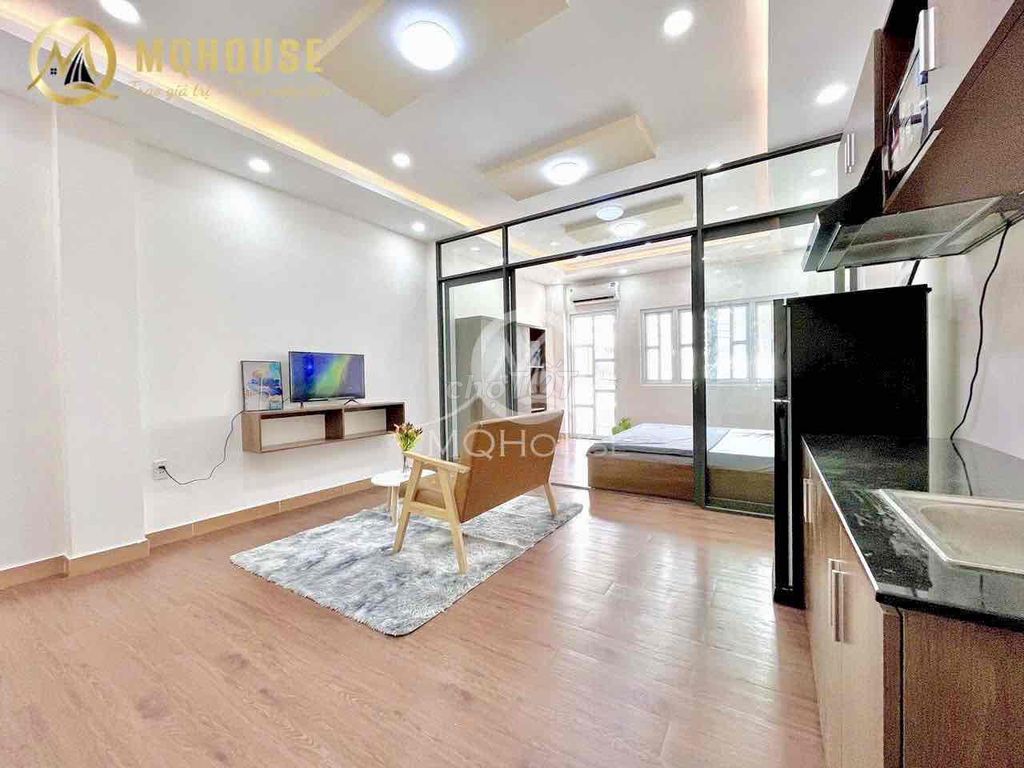 The apartment is a super-wide kitchen room, right at  cmt8 - 716.