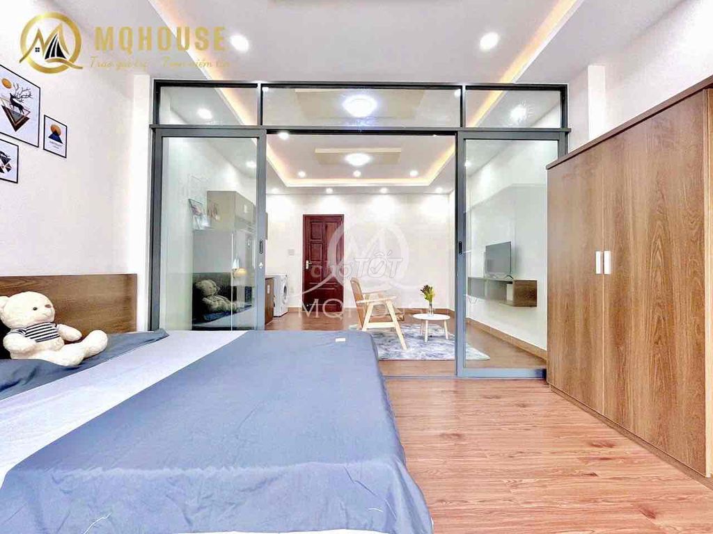 The apartment is a super-wide kitchen room, right at  cmt8 - 716.