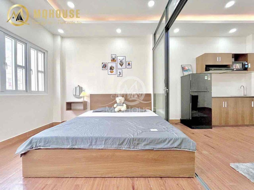 The apartment is a super-wide kitchen room, right at  cmt8 - 716.