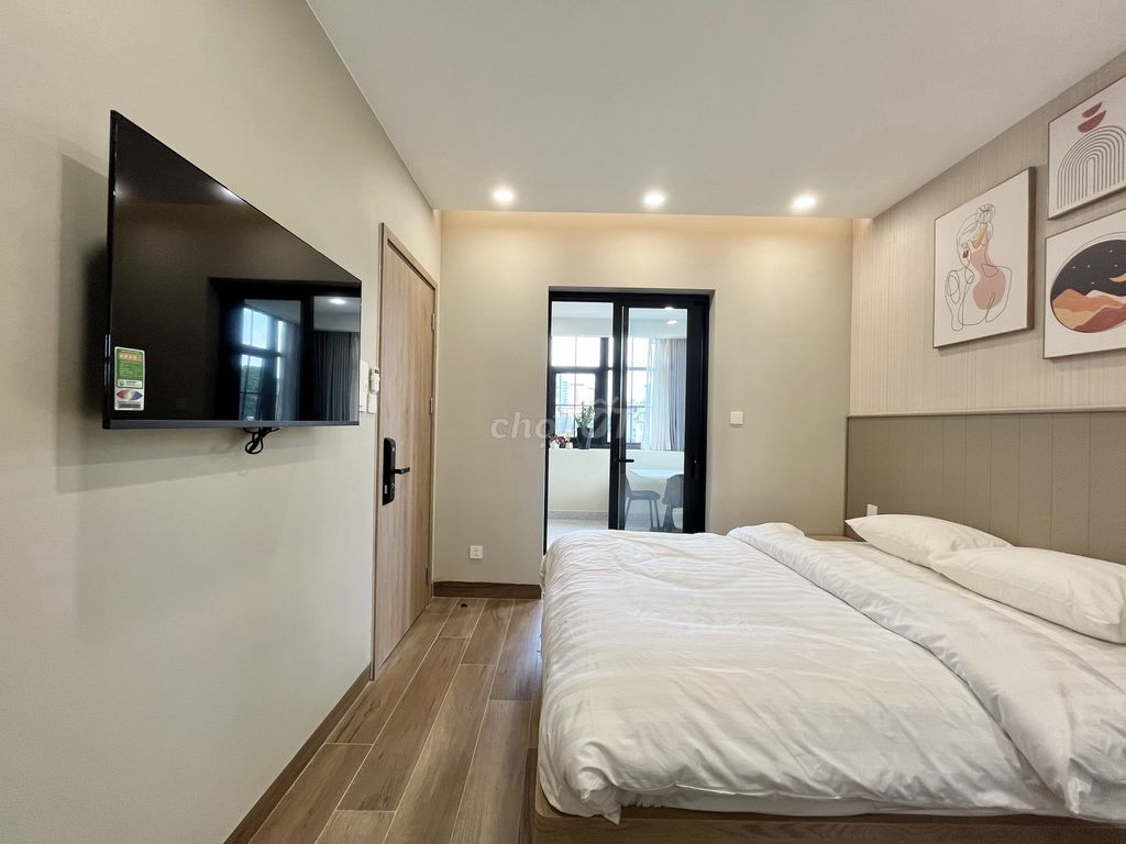 The studio is empty. One bedroom full of high-end furniture - right around the ceiling.