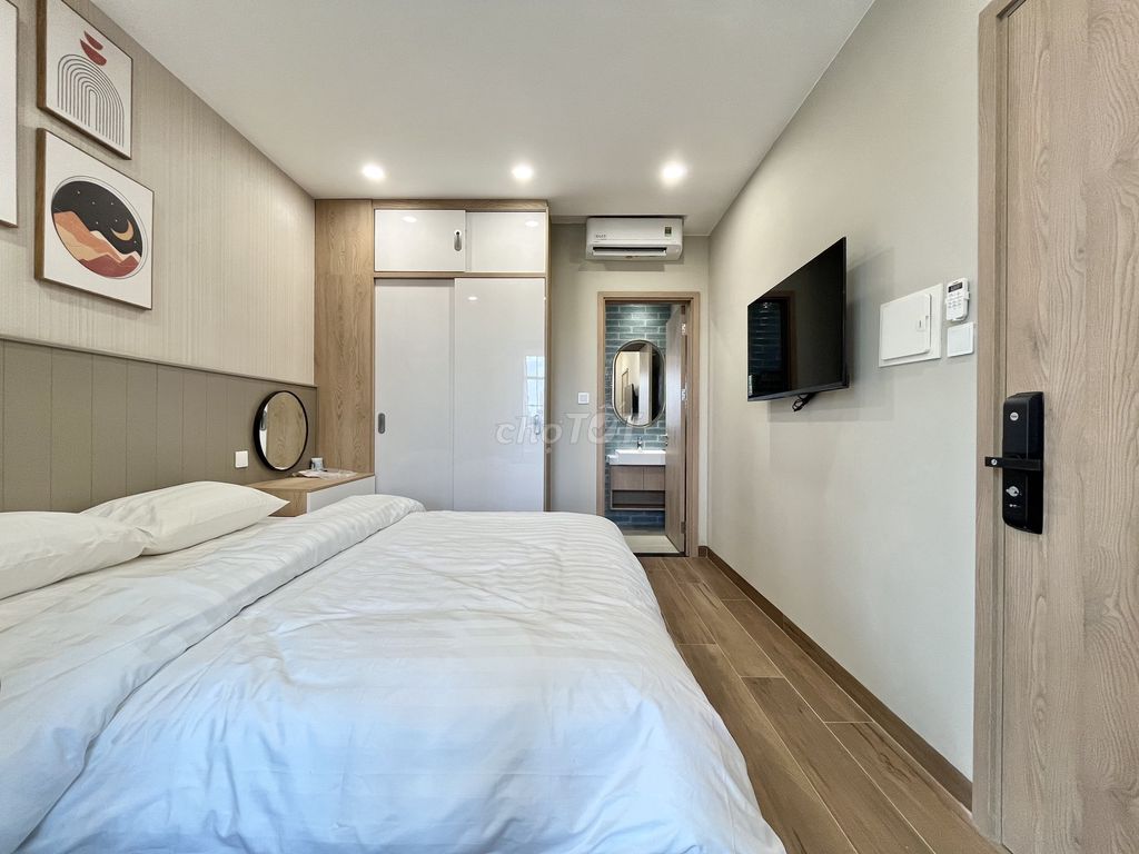 The studio is empty. One bedroom full of high-end furniture - right around the ceiling.