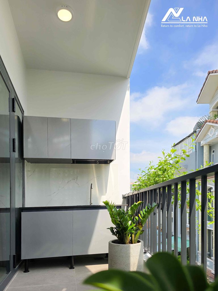 Open the apartment with a balcony. <i>The full interior corner near etown