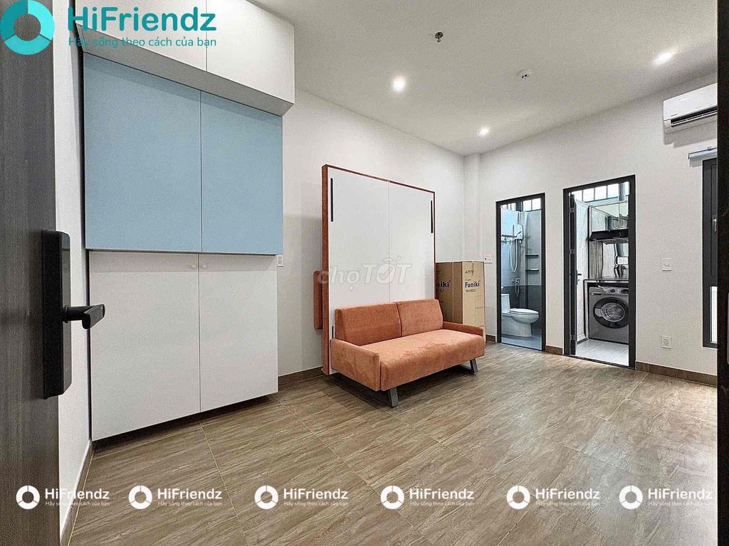 The studio is full of furniture at the university.