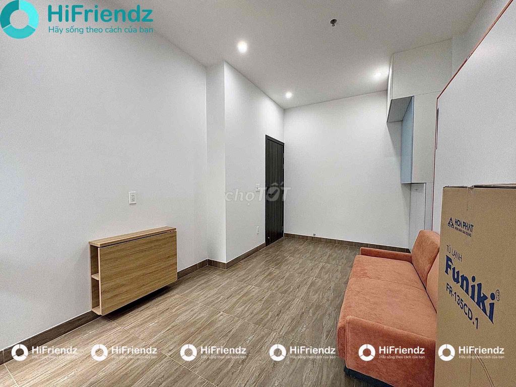 The studio is full of furniture at the university.