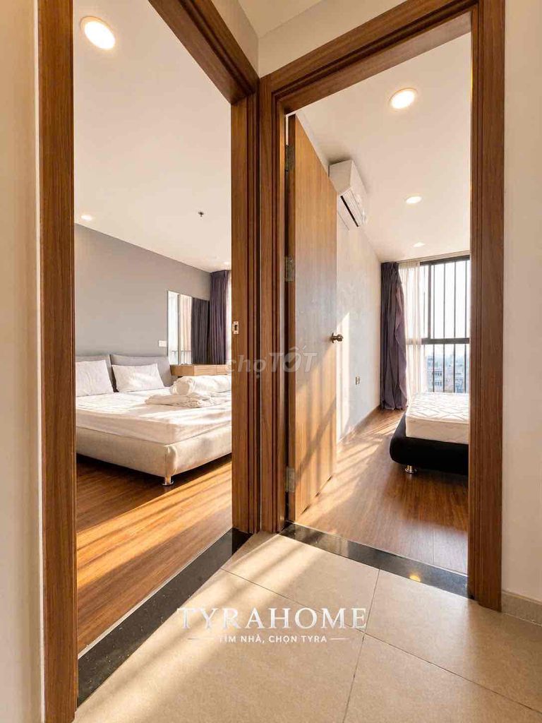 Two bedrooms. A modern bedroom.