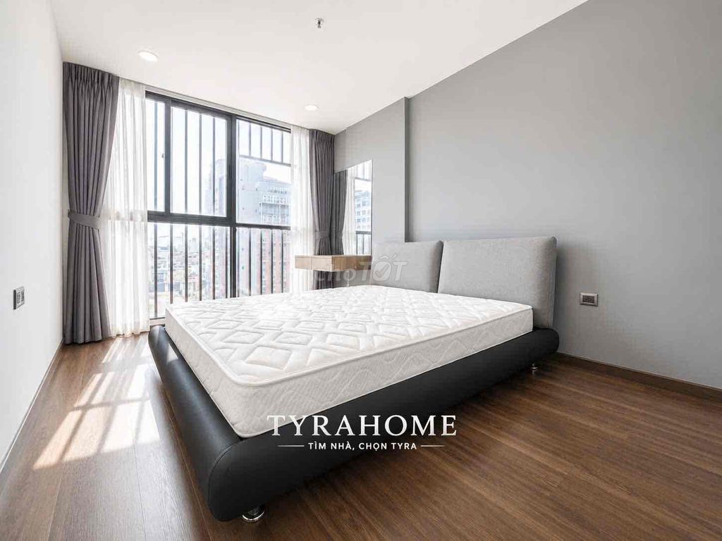 Two bedrooms. A modern bedroom.