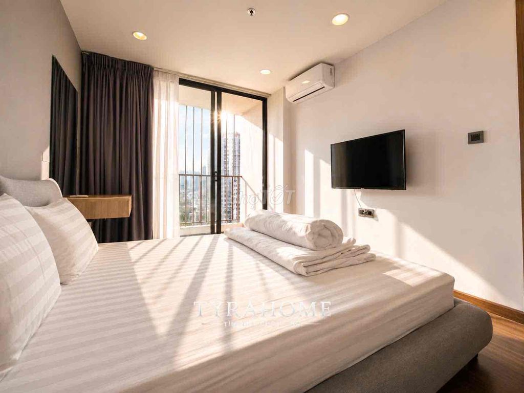 Two bedrooms. A modern bedroom.