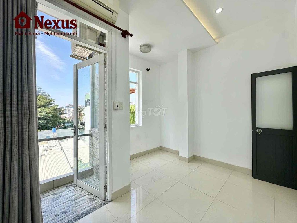 Two bedrooms. One bathroom with a balcony that's been raised super wide.