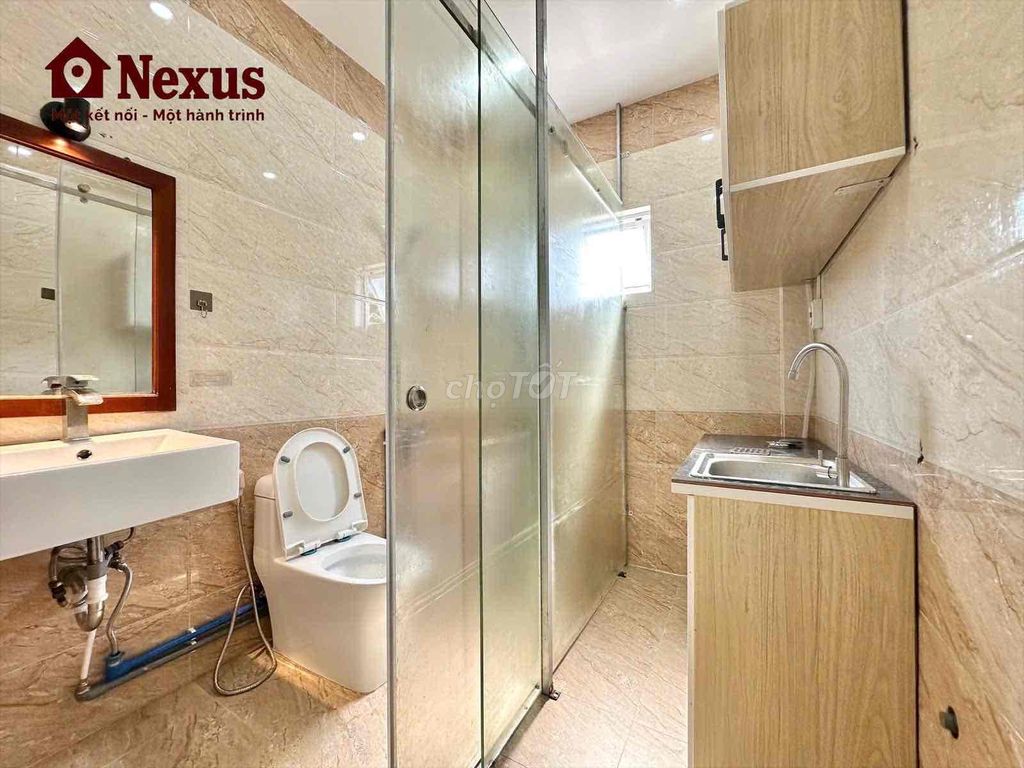 Two bedrooms. One bathroom with a balcony that's been raised super wide.