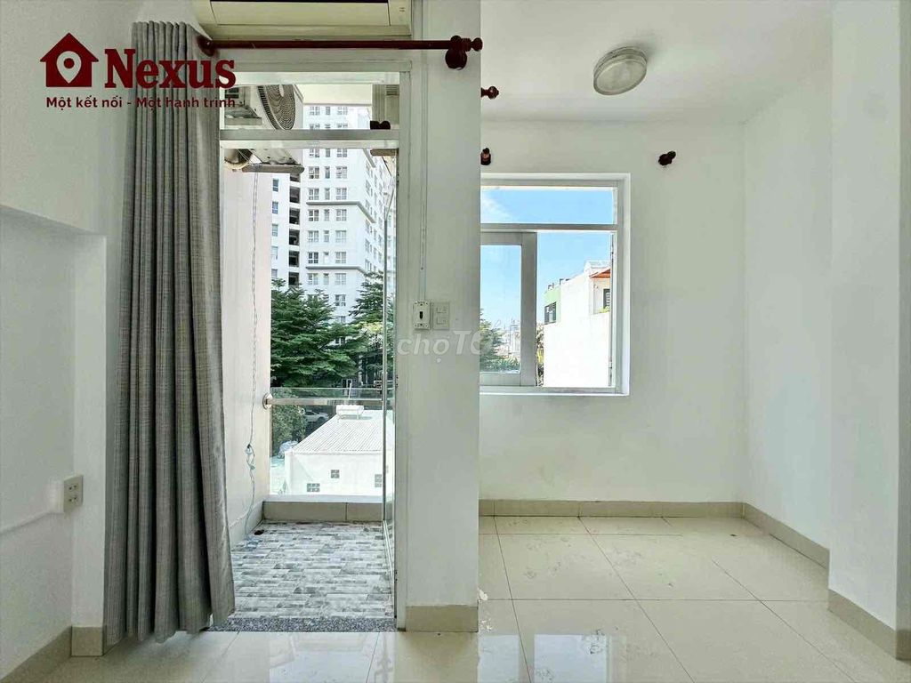Two bedrooms. One bathroom with a balcony that's been raised super wide.