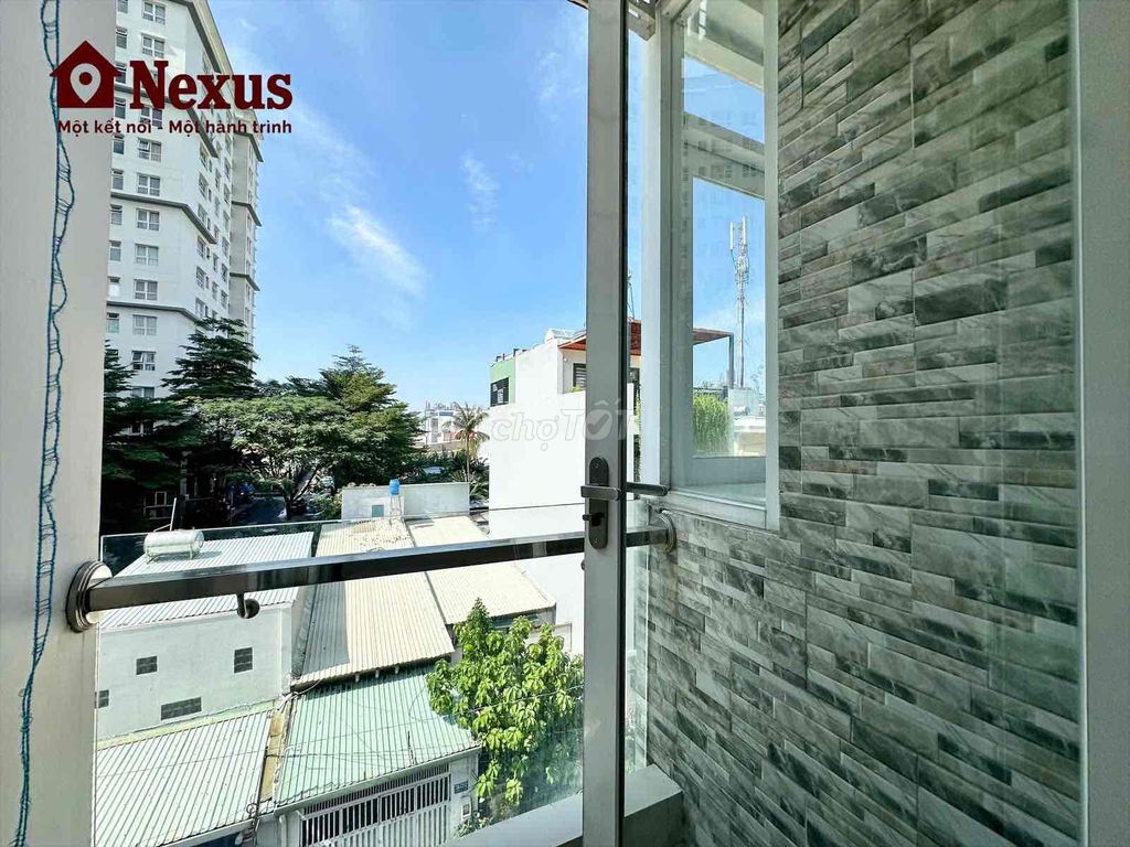 Two bedrooms. One bathroom with a balcony that's been raised super wide.
