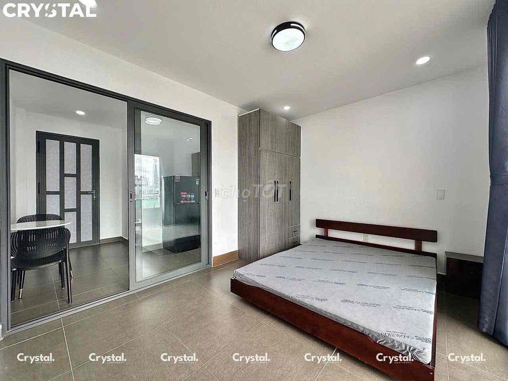 A large balcony bedroom - just Khuông Việt, near the shower.