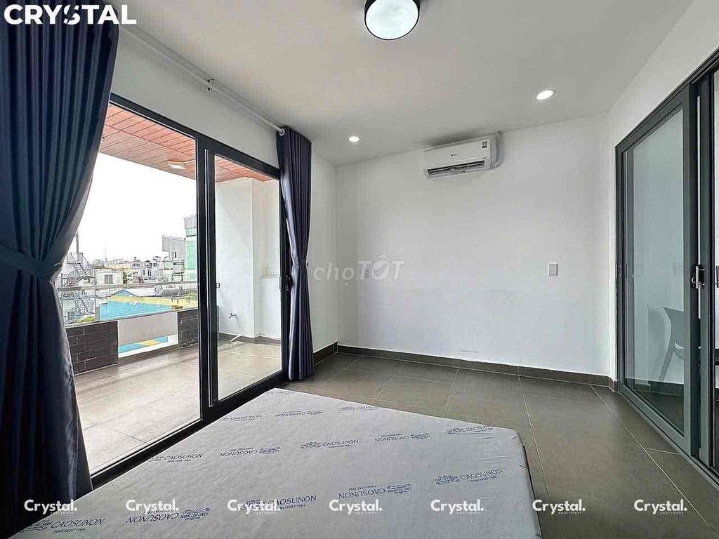 A large balcony bedroom - just Khuông Việt, near the shower.