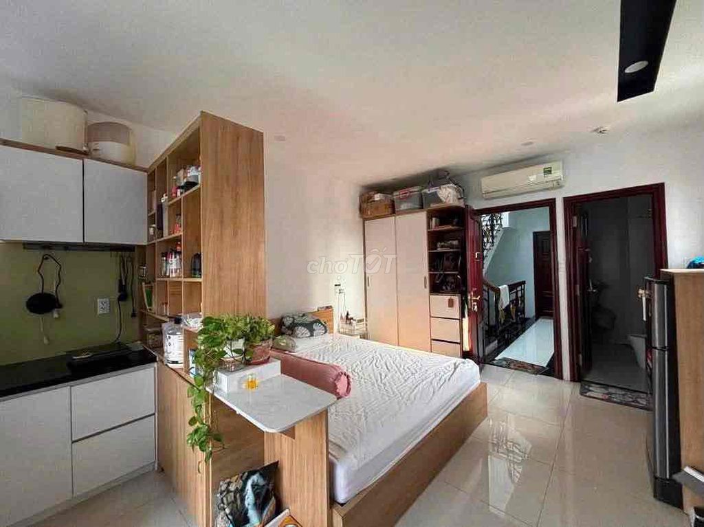 The apartment's nice and cool, and there's a window.