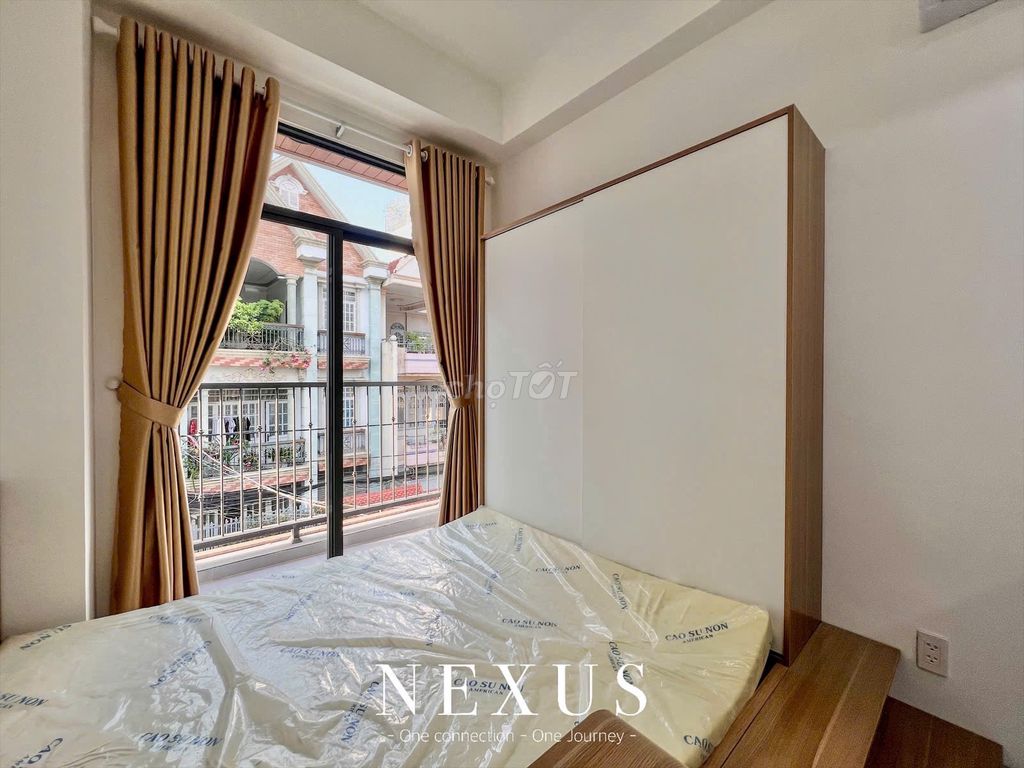High-level balcony studio - full interior - elevator