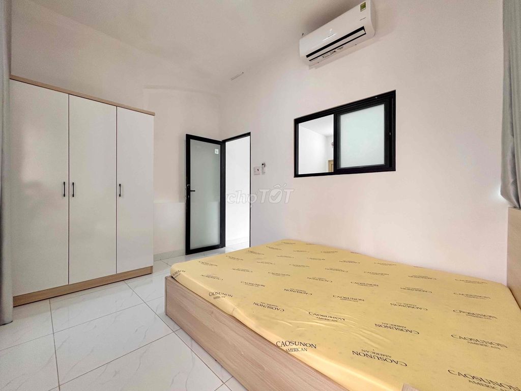 The 1st Bedroom of the Private Washer Full of Homes right down to 4 Phú Nhuận