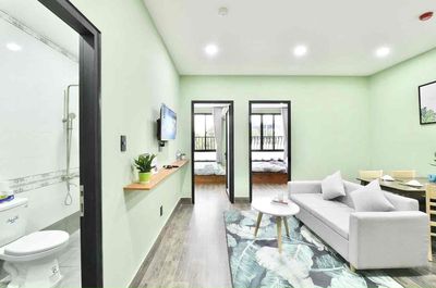 Two bedrooms balcony. She's a Bình Thạnh.