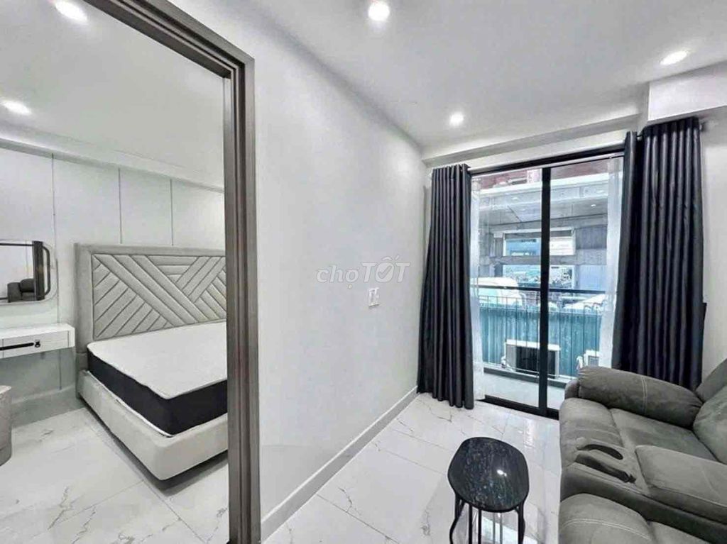 The apartment. A big balcony bedroom. Two empty ladies.