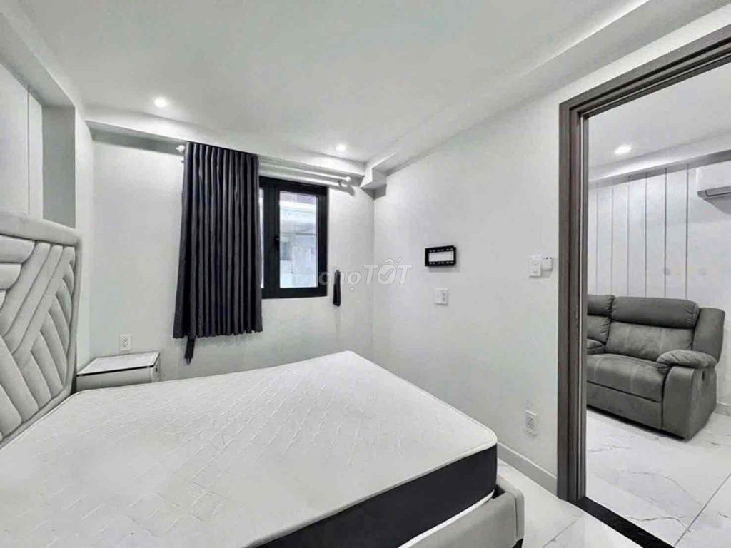 The apartment. A big balcony bedroom. Two empty ladies.
